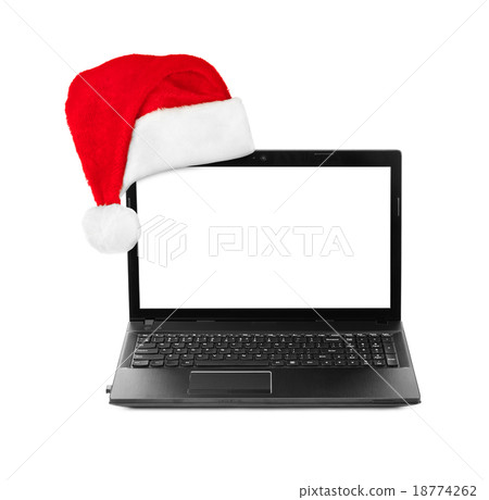Notebook computer and Santa Claus christmas hat 18774262