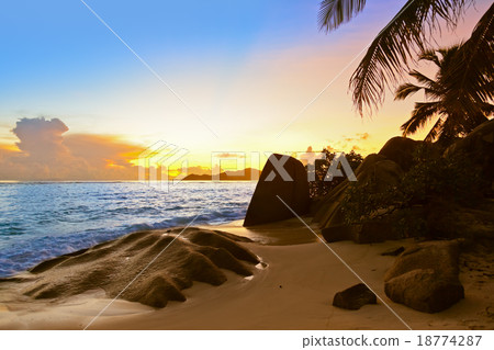 Sunset on beach Source D'Argent at Seychelles 18774287