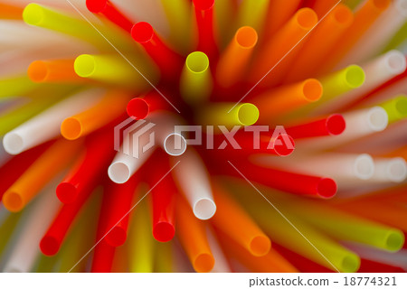 Collection colored drinking straws in blur. 18774321