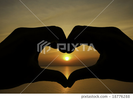 Love shape hand silhouette in sky Love shape hand silhouette in sky 18776288