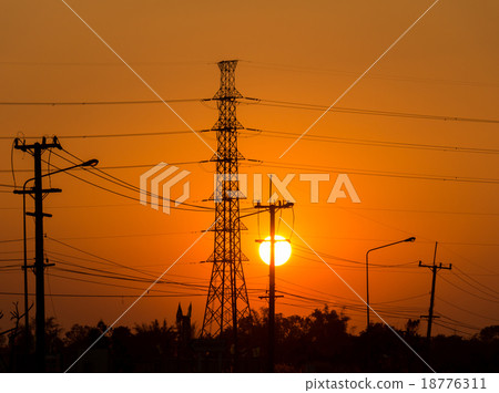 high voltage post.High-voltage tower and sunset high voltage post.High-voltage tower and sunset 18776311