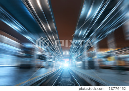 Railway station at night with motion blur effect 18776462