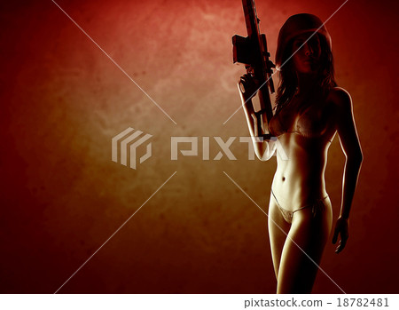 Beautiful sexy bikini woman holding army weapon 18782481