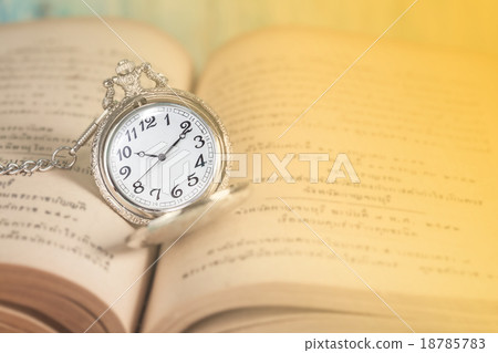 vintage pocket clock and old books vintage pocket clock and old books 18785783