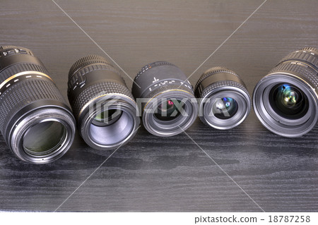Various lenses arranged on the table 18787258