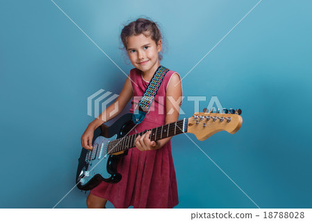Girl European appearance ten years playing guitar Girl European appearance ten years playing guitar 18788028