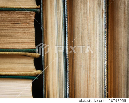 Background made of old books arranged in stacks Background made of old books arranged in stacks 18792066