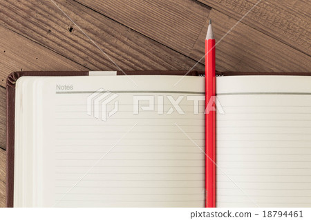 Note blank open book with orange pencil 18794461