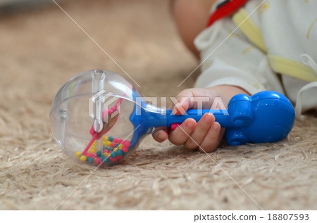 Baby's hand with toys 18807593