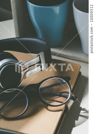 Relax time!! Headset, glasses and diary  18809312