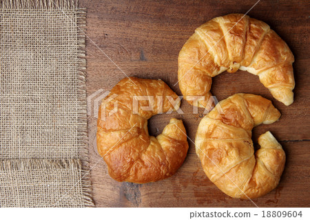 croissant bakery on teakwood table 18809604
