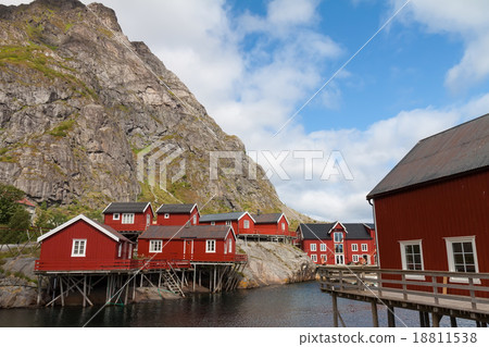 Typical red rorbu fishing hut in town of A village 18811538