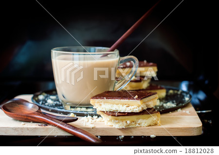 Tea with Chocolate Cookies on Black Background 18812028
