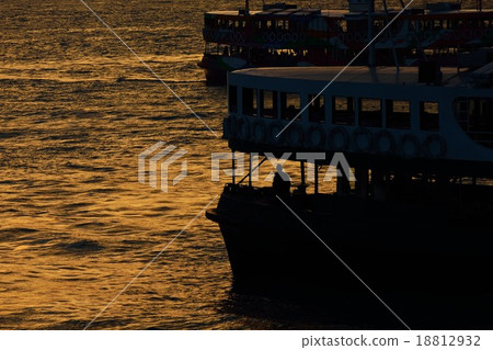 Hong Kong Star Ferry shining in evening scenery Hong Kong Star Ferry shining in evening scenery 18812932