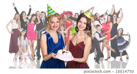 Young women foreground with people crowd 18814750