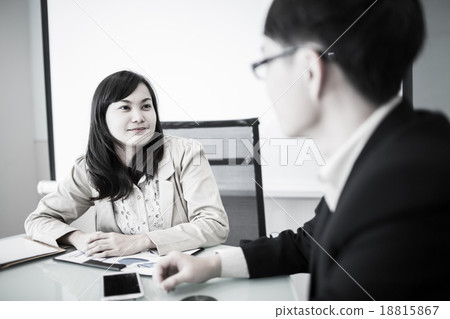 Successful young business executives meeting at the office Successful young business executives meeting at the office 18815867