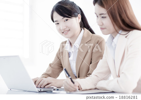 Business people discussing the charts and graphs showing the res 18816281