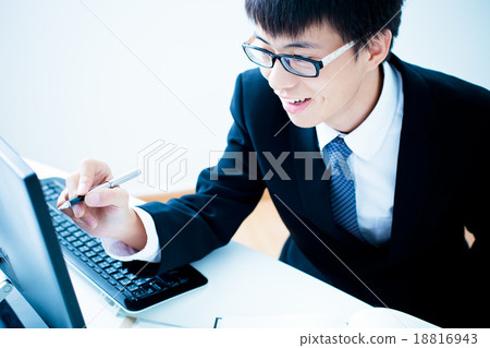 Businessman analyzing investment charts. Accounting Businessman analyzing investment charts. Accounting 18816943