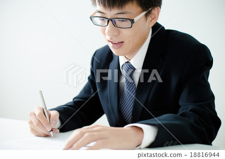 Business man signing a contract Business man signing a contract 18816944
