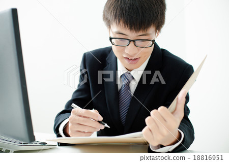 Businessman analyzing investment charts. Accounting Businessman analyzing investment charts. Accounting 18816951