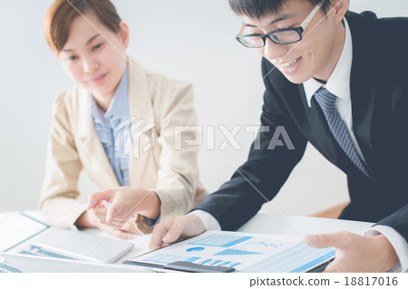 Business people discussing the charts and graphs showing the res 18817016