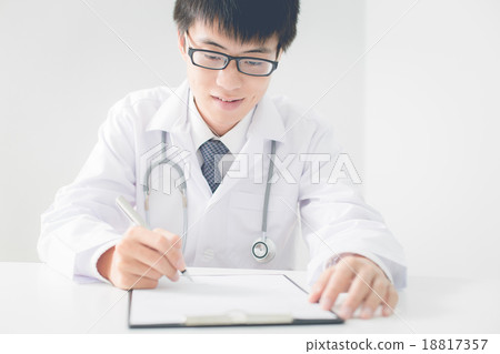 Close-up Of Male Doctor Filling The Medical Form 18817357
