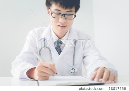 Close-up Of Male Doctor Filling The Medical Form 18817366