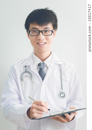 Close-up Of Male Doctor Filling The Medical Form 18817417