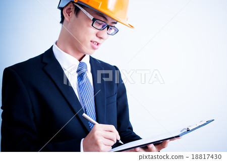 Architect sketching a construction project 18817430
