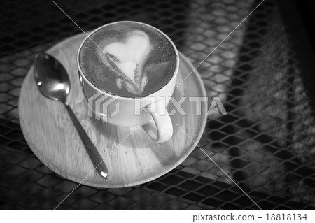 Hot art Latte Coffee in a cup on wooden table. Hot art Latte Coffee in a cup on wooden table. 18818134