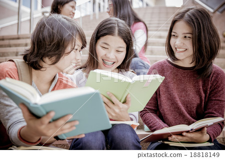 group of happy teen high school students outdoors 18818149