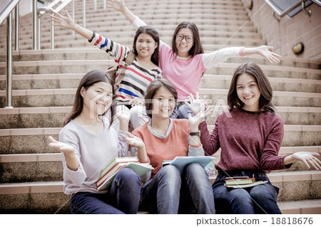 group of happy teen high school students outdoors 18818676
