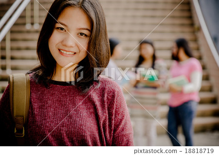 group of happy teen high school students outdoors 18818719