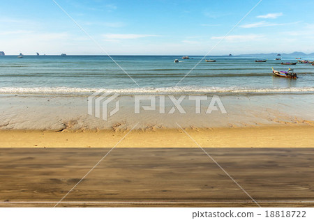 Wood table top on blue sea & sky background can put or montage y 18818722