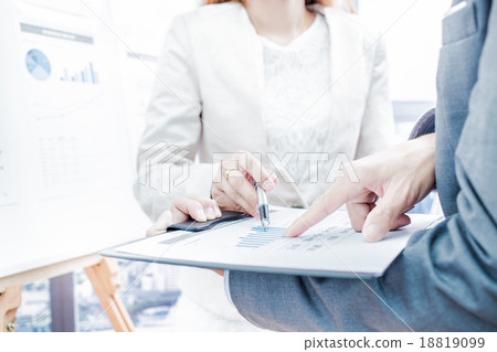 Business people discussing the charts and graphs showing the res 18819099