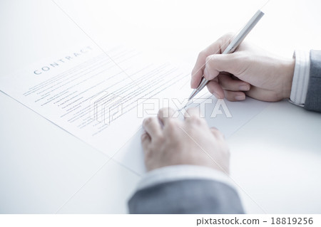 Business man signing a contract Business man signing a contract 18819256