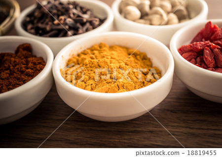 Wooden table of colorful spices 18819455