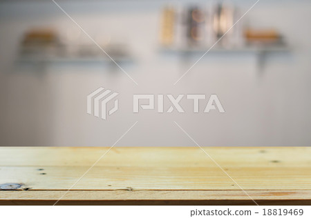 Selected focus empty brown wooden table and Coffee shop blur bac 18819469
