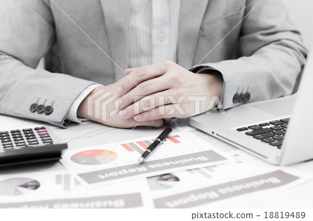 Businessman analyzing investment charts with laptop. Accounting Businessman analyzing investment charts with laptop. Accounting 18819489
