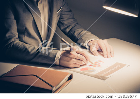 man hand with pen and business report. Accounting man hand with pen and business report. Accounting 18819677