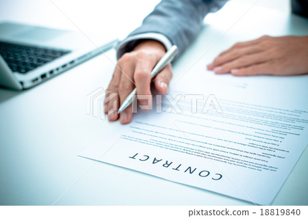 Business man signing a contract Business man signing a contract 18819840