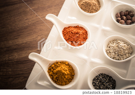 Wooden table of colorful spices 18819923