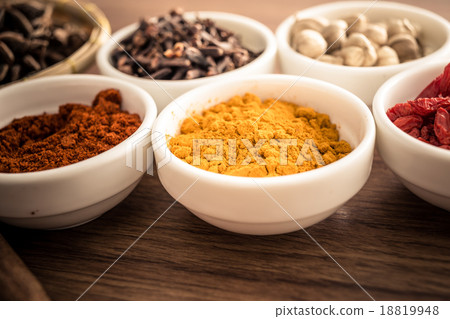 Wooden table of colorful spices 18819948