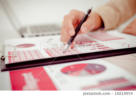 woman hand with business report 18819954