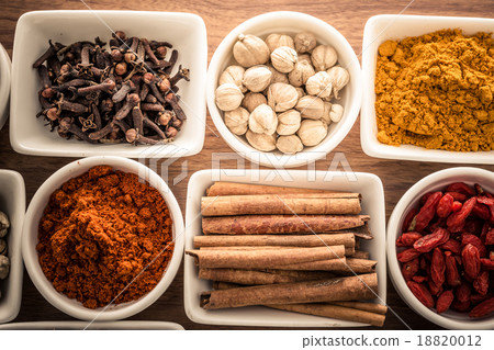 Wooden table of colorful spices 18820012