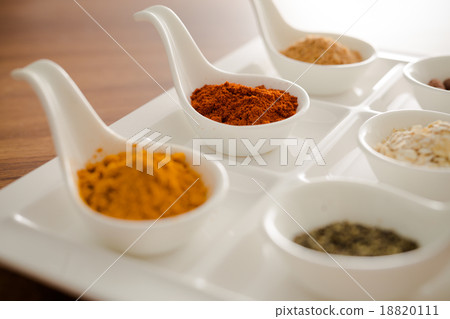 Wooden table of colorful spices 18820111