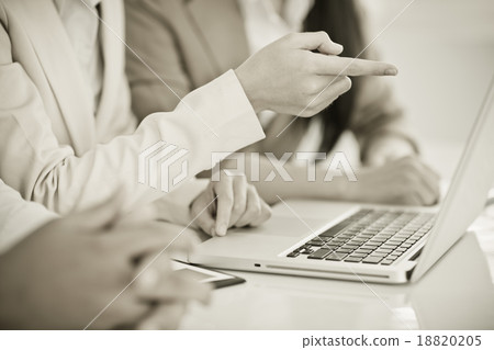 Business people discussing the charts and graphs showing the res 18820205