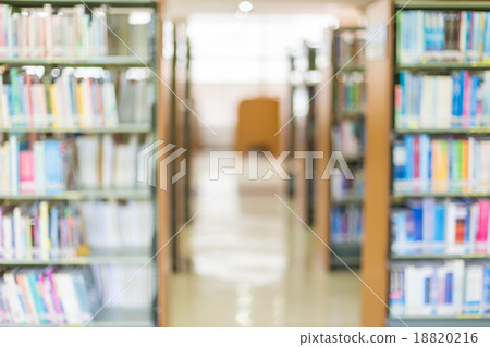 books on bookshelf in library, abstract blur defocused backgroun 18820216