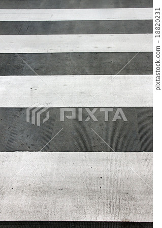 jaywalking across the street. 18820231