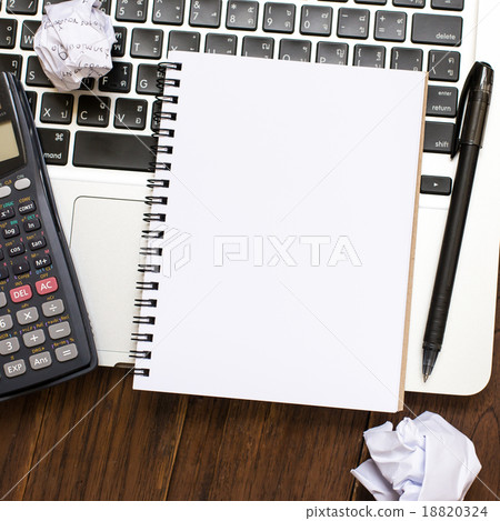 Notebook an address book with blank sheets and calculator on the Notebook an address book with blank sheets and calculator on the 18820324